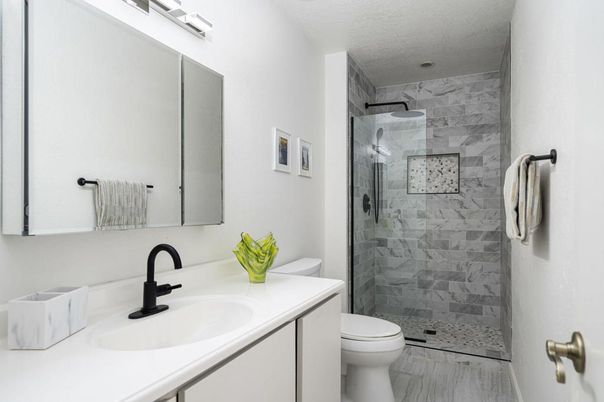 Bathroom, Glass Shower, Interior, Marble Walls, Wood Texture Flooring