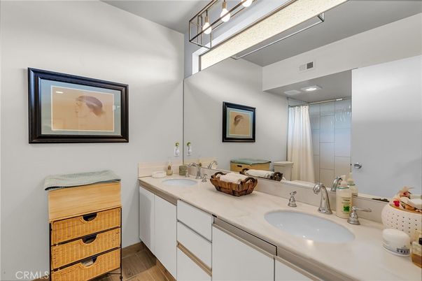 Bathroom, Dual Sink Vanities, Interior, Recessed Lighting, Wood Texture Flooring