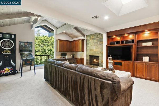 Fireplace, Interior, Living room, Recessed Lighting, Stone Walls, Wooden Beams, Wooden Ceilings