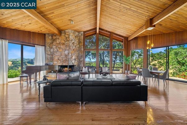 Dining room, Fireplace, Interior, Living room, Pendant Lights, Piano, Stone Walls, Wooden Beams, Wooden Ceilings, Wood Texture Flooring