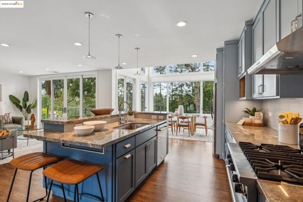 Dining room, Interior, Kitchen, Pendant Lights, Recessed Lighting, Stainless Steel Appliances, Wood Texture Flooring