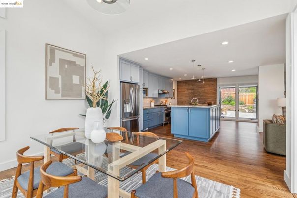 Dining room, Interior, Kitchen, Pendant Lights, Recessed Lighting, Stainless Steel Appliances, Wood Texture Flooring