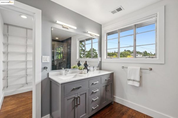 Bathroom, Dual Sink Vanities, Glass Shower, Interior, Recessed Lighting, Wood Texture Flooring