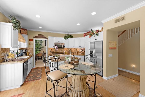 Dining room, Interior, Kitchen, Recessed Lighting, Stainless Steel Appliances, Wood Texture Flooring