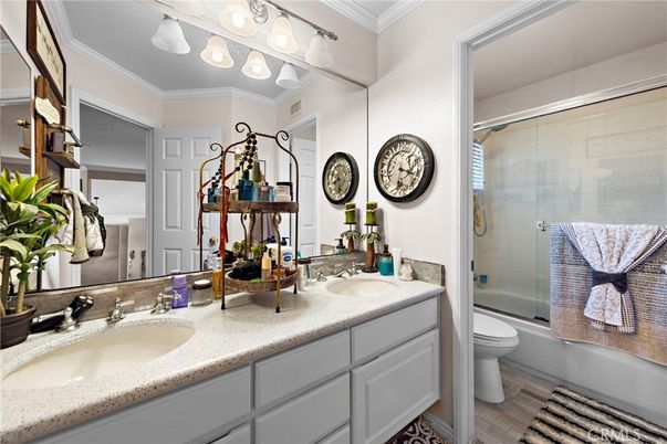 Bathroom, Dual Sink Vanities, Glass Shower, Interior, Wood Texture Flooring
