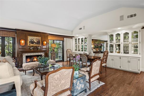 Dining room, Fireplace, Interior, Living room, Recessed Lighting, Wood Texture Flooring