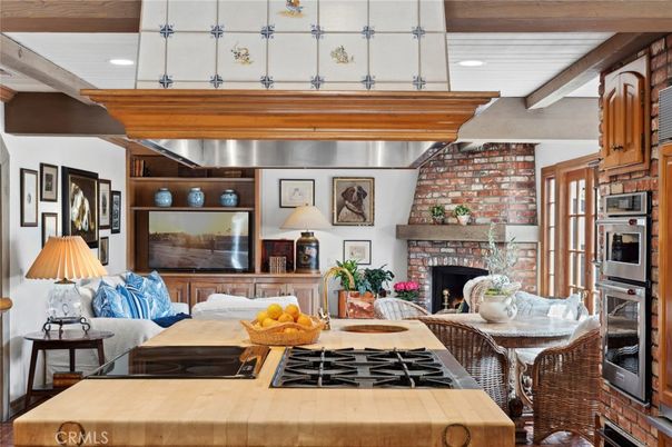 Fireplace, Interior, Kitchen, Living room, Recessed Lighting, Stainless Steel Appliances, Stone Walls, Wooden Beams