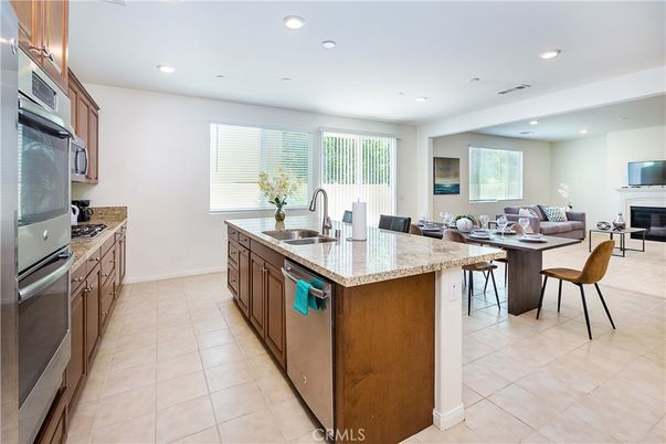 Dining room, Fireplace, Interior, Kitchen, Living room, Recessed Lighting, Stainless Steel Appliances