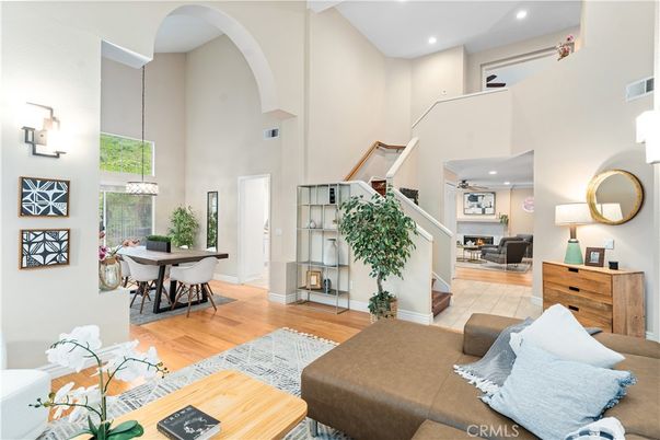 Dining room, Fireplace, Interior, Living room, Pendant Lights, Recessed Lighting, Wood Texture Flooring