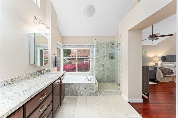Bathroom, Bedroom, Dual Sink Vanities, Glass Shower, Interior, Wood Texture Flooring