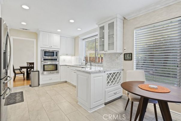 Dining room, Interior, Kitchen, Recessed Lighting, Stainless Steel Appliances, Wood Texture Flooring