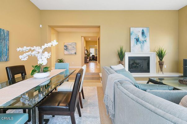 Dining room, Fireplace, Interior, Living room, Recessed Lighting, Wood Texture Flooring