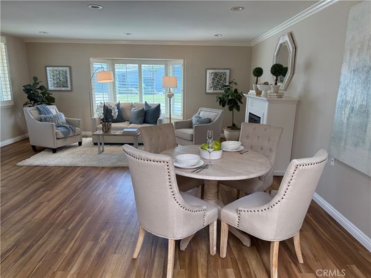 Dining room, Fireplace, Interior, Living room, Recessed Lighting, Wood Texture Flooring