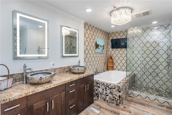Bathroom, Chandelier, Dual Sink Vanities, Interior, Recessed Lighting, Wood Texture Flooring