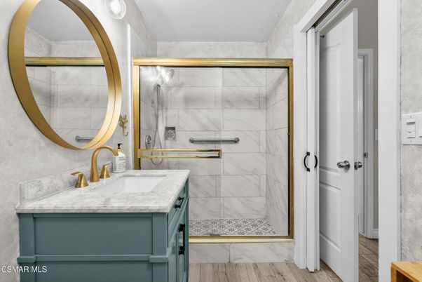 Bathroom, Glass Shower, Interior, Marble Walls, Wood Texture Flooring