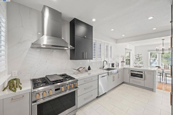 Dining room, Interior, Kitchen, Marble Walls, Pendant Lights, Recessed Lighting, Stainless Steel Appliances