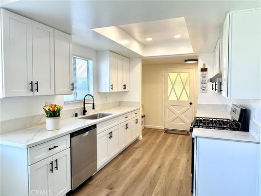 Interior, Kitchen, Recessed Lighting, Stainless Steel Appliances, Wood Texture Flooring