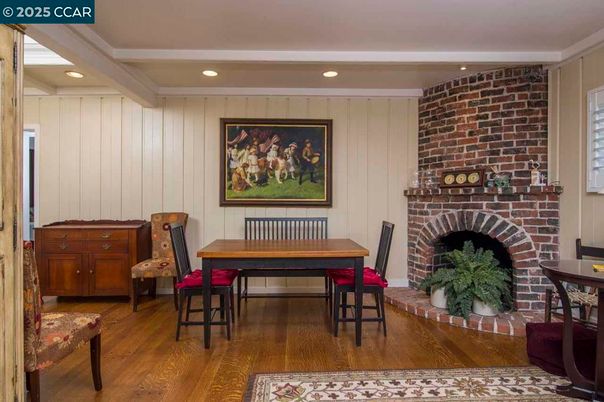 Dining room, Fireplace, Interior, Recessed Lighting, Stone Walls, Wood Texture Flooring