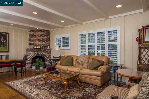 Fireplace, Interior, Living room, Recessed Lighting, Stone Walls, Wood Texture Flooring