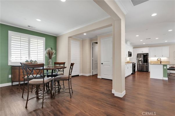 Dining room, Interior, Kitchen, Recessed Lighting, Stainless Steel Appliances, Wood Texture Flooring