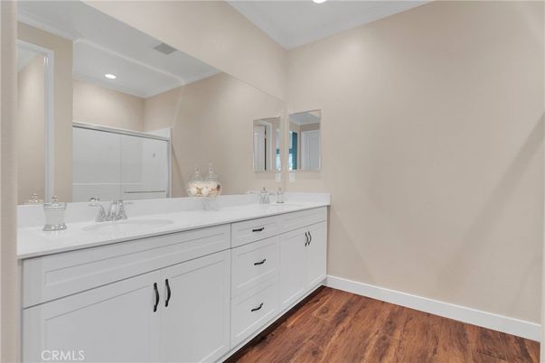 Bathroom, Dual Sink Vanities, Interior, Recessed Lighting, Wood Texture Flooring