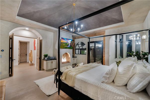 Bedroom, Fireplace, Interior, Pendant Lights, Recessed Lighting, Wood Texture Flooring