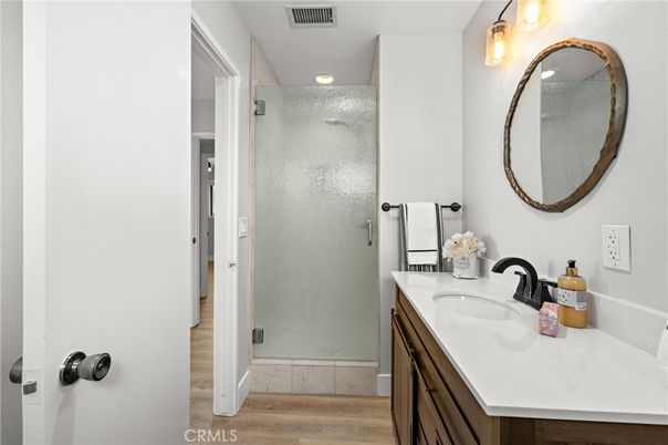 Bathroom, Glass Shower, Interior, Recessed Lighting, Wood Texture Flooring