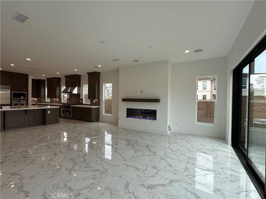 Fireplace, Interior, Kitchen, Marble, Recessed Lighting, Stainless Steel Appliances