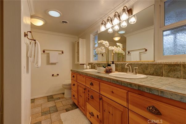 Bathroom, Dual Sink Vanities, Interior, Recessed Lighting, Tile Countertops
