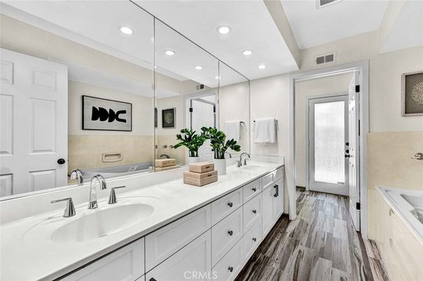 Bathroom, Dual Sink Vanities, Interior, Recessed Lighting, Wood Texture Flooring