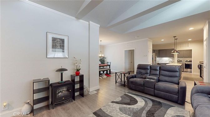 Dining room, Interior, Kitchen, Living room, Pendant Lights, Recessed Lighting, Stainless Steel Appliances, Wood Texture Flooring