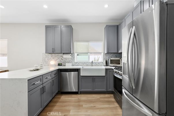 Interior, Kitchen, Recessed Lighting, Stainless Steel Appliances, Wood Texture Flooring