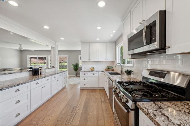 Interior, Kitchen, Recessed Lighting, Stainless Steel Appliances, Wood Texture Flooring