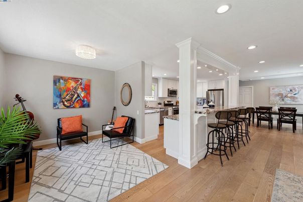 Chandelier, Dining room, Interior, Kitchen, Recessed Lighting, Stainless Steel Appliances, Wood Texture Flooring