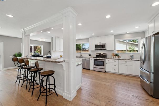Interior, Kitchen, Recessed Lighting, Stainless Steel Appliances, Wood Texture Flooring