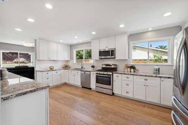 Interior, Kitchen, Recessed Lighting, Stainless Steel Appliances, Wood Texture Flooring