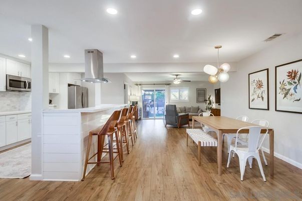 Dining room, Interior, Kitchen, Living room, Pendant Lights, Recessed Lighting, Stainless Steel Appliances, Wood Texture Flooring