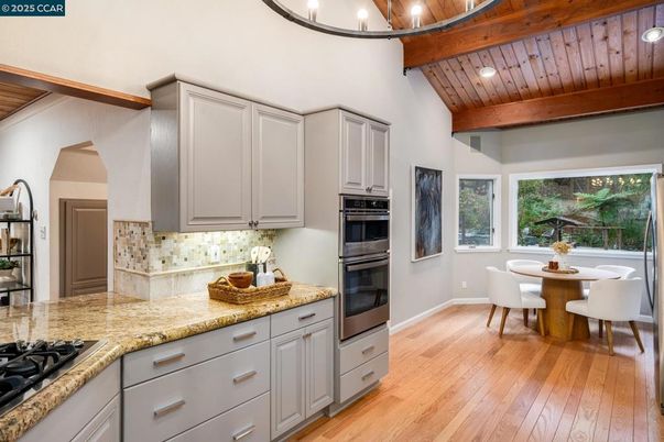 Dining room, Interior, Kitchen, Recessed Lighting, Stainless Steel Appliances, Wooden Beams, Wooden Ceilings, Wood Texture Flooring