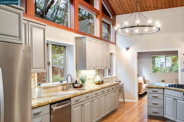 Chandelier, Interior, Kitchen, Pendant Lights, Stainless Steel Appliances, Wooden Ceilings, Wood Texture Flooring
