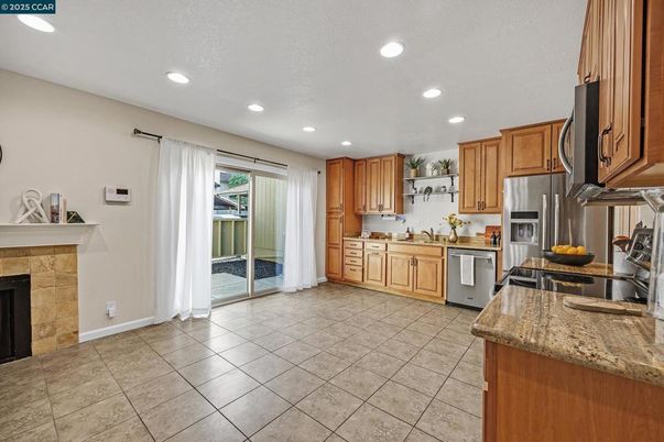 Fireplace, Interior, Kitchen, Recessed Lighting, Stainless Steel Appliances