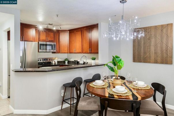 Dining room, Interior, Kitchen, Pendant Lights, Stainless Steel Appliances, Wood Texture Flooring