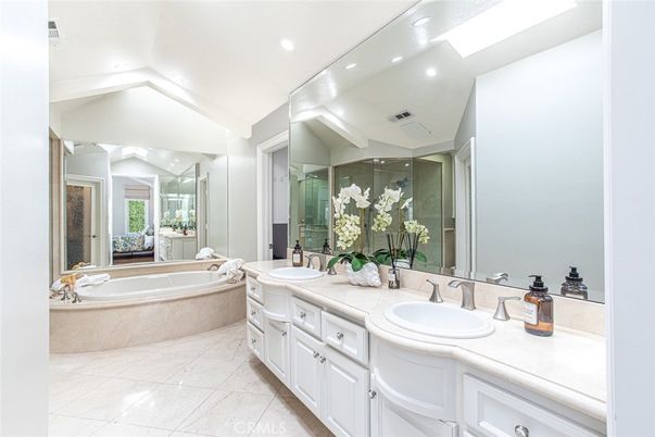 Bathroom, Dual Sink Vanities, Glass Shower, Interior, Recessed Lighting, Tile Countertops