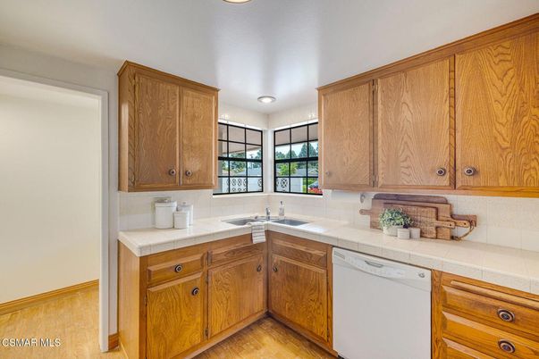 Interior, Kitchen, Recessed Lighting, Tile Countertops, Wood Texture Flooring
