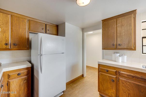 Interior, Kitchen, Tile Countertops, Wood Texture Flooring