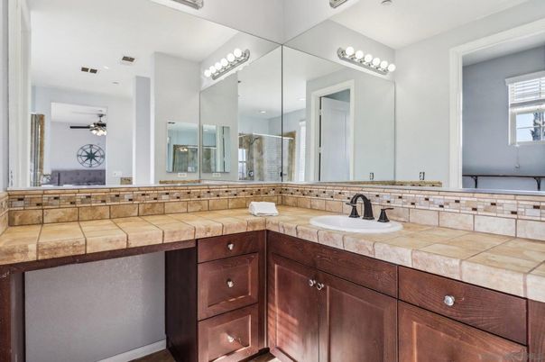 Bathroom, Dual Sink Vanities, Interior, Recessed Lighting, Tile Countertops