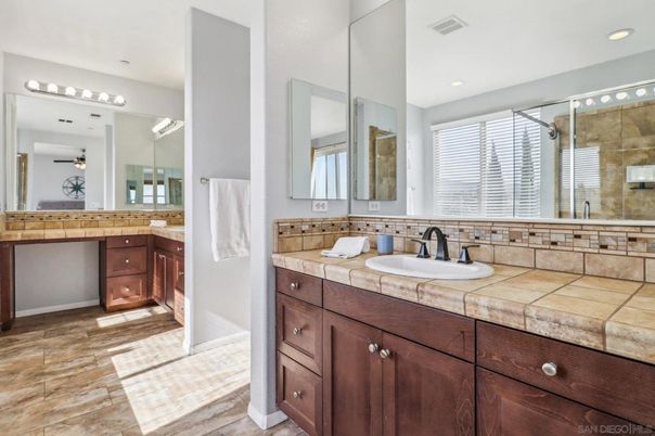 Bathroom, Dual Sink Vanities, Glass Shower, Interior, Recessed Lighting, Tile Countertops