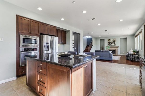 Fireplace, Interior, Kitchen, Living room, Recessed Lighting, Stainless Steel Appliances