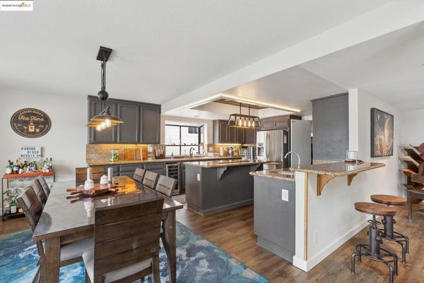 Dining room, Interior, Kitchen, Pendant Lights, Stainless Steel Appliances, Wood Texture Flooring