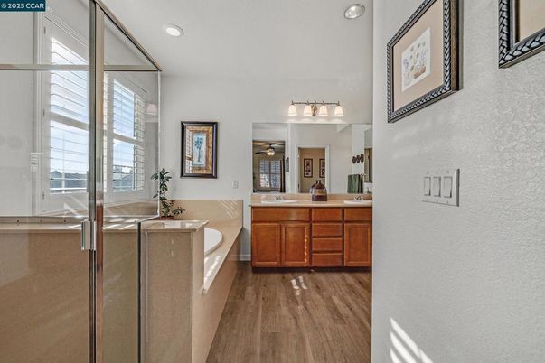 Bathroom, Dual Sink Vanities, Interior, Recessed Lighting, Wood Texture Flooring