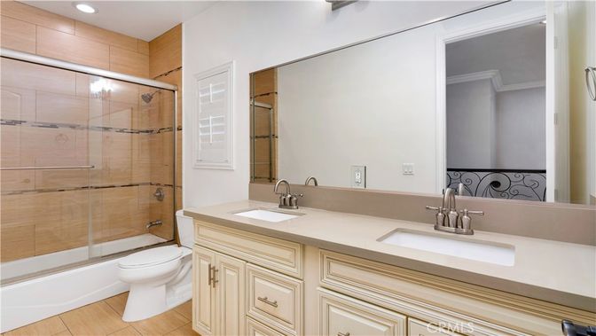Bathroom, Dual Sink Vanities, Glass Shower, Interior, Recessed Lighting, Wood Texture Flooring